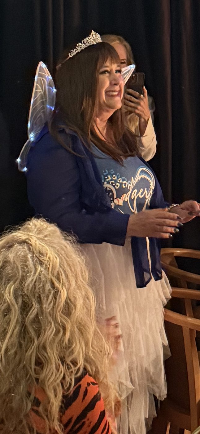 Marni at a party, in a tiara, entirely in her element