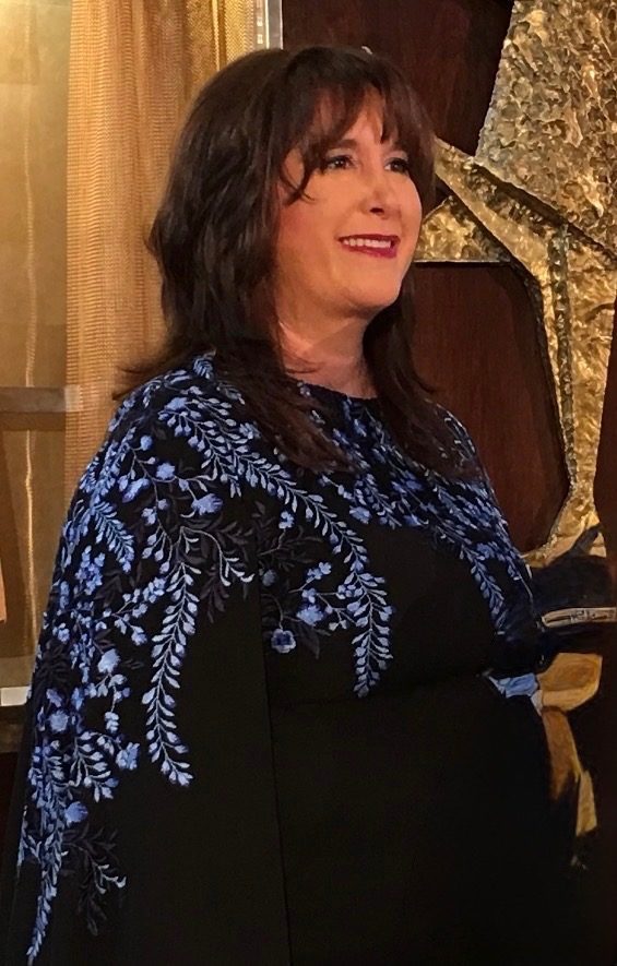 Marni mid-laugh — the sound you could hear across the room